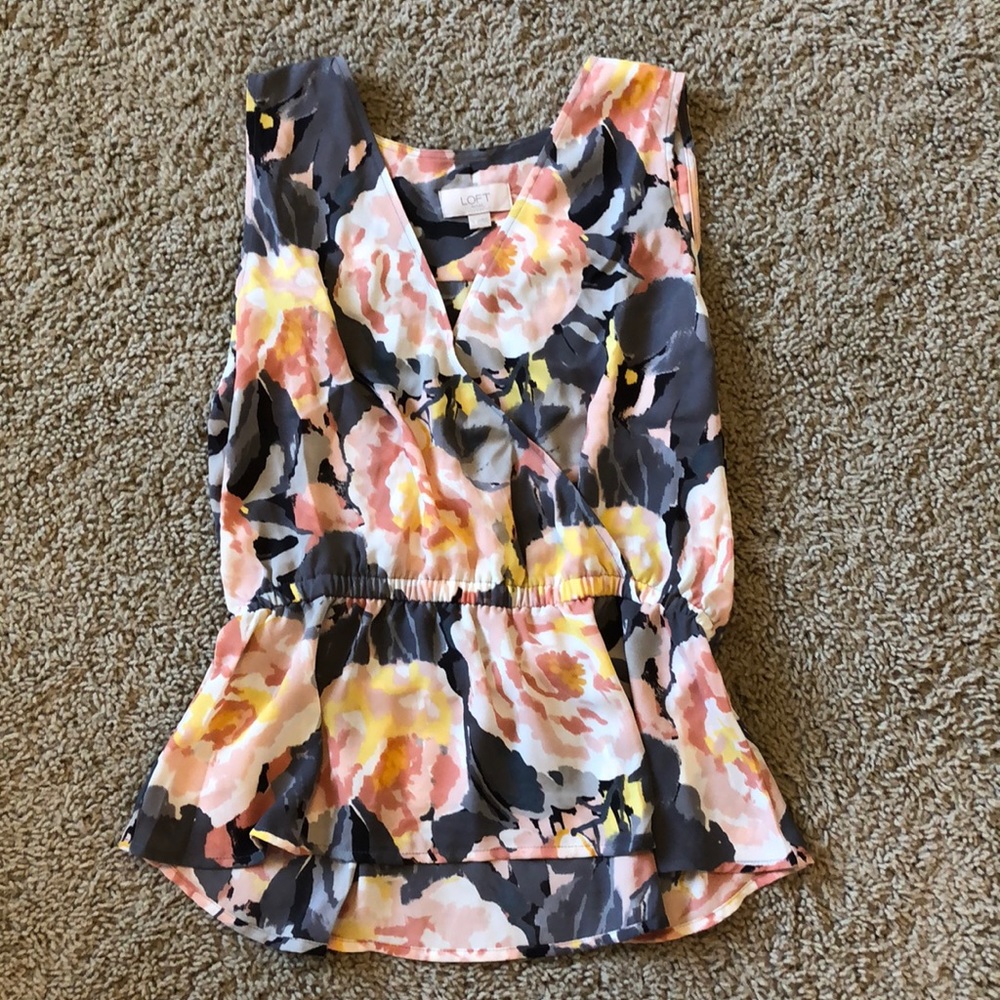 Never worn floral peplum blouse
